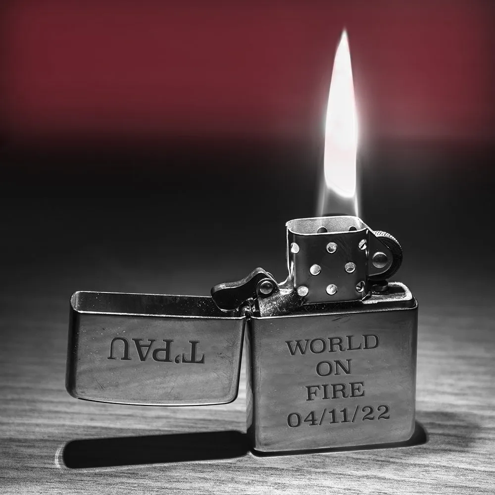 A close up of a lighter with a lit flame